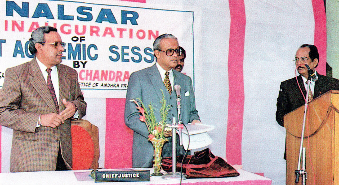 Hon'ble Mr. Justice U.C. Banerjee, the Founder-President of the University releasing the Course Material on the day of Inauguration of First Academic Session of the University (1998-99) on 1-12-1998. Others are Prof. (Dr.) Ranbir Singh, Director and Mr. Y.V. Rama Krishna, Registrar